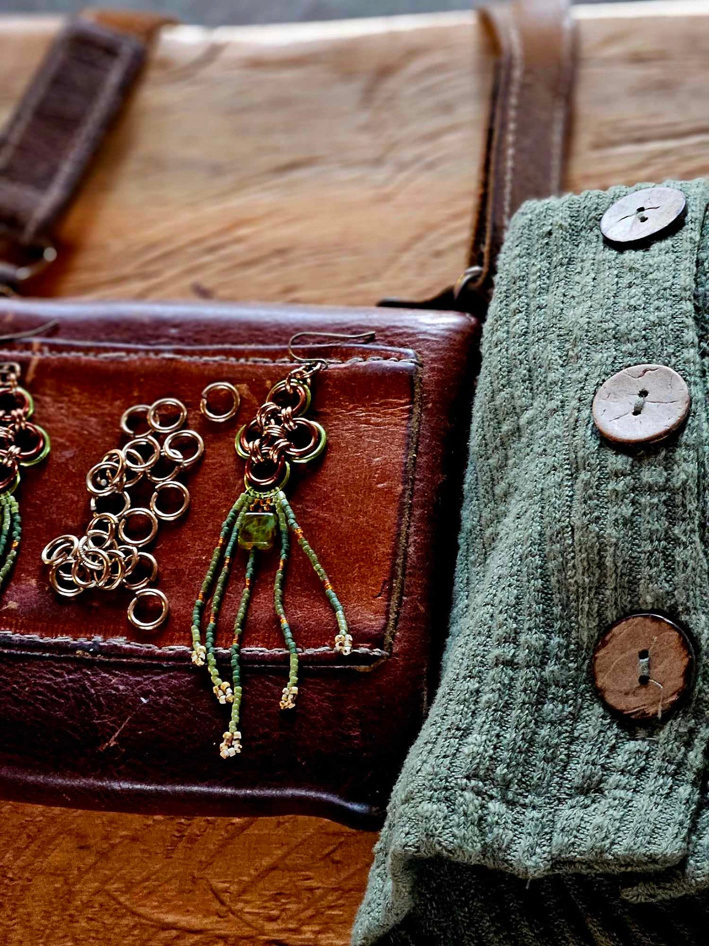 Elevate your style with our Green Japanese Cross Earrings. Handcrafted with a Japanese chainmaille design and Miyuki glass beads. Add a unique touch to your outfit.