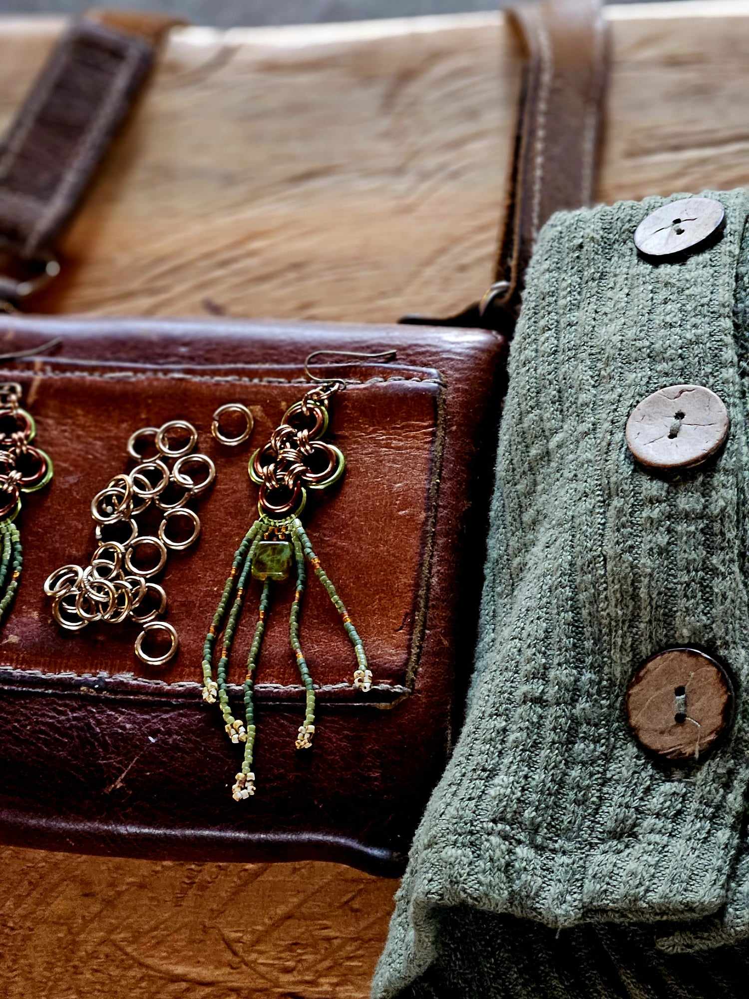 Elevate your style with our Green Japanese Cross Earrings. Handcrafted with a Japanese chainmaille design and Miyuki glass beads. Add a unique touch to your outfit.